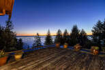 Enjoy breathtaking sunsets and serene water views from this stunning property.