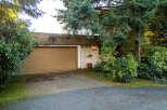 Discover this charming property featuring a spacious garage and a welcoming facade.