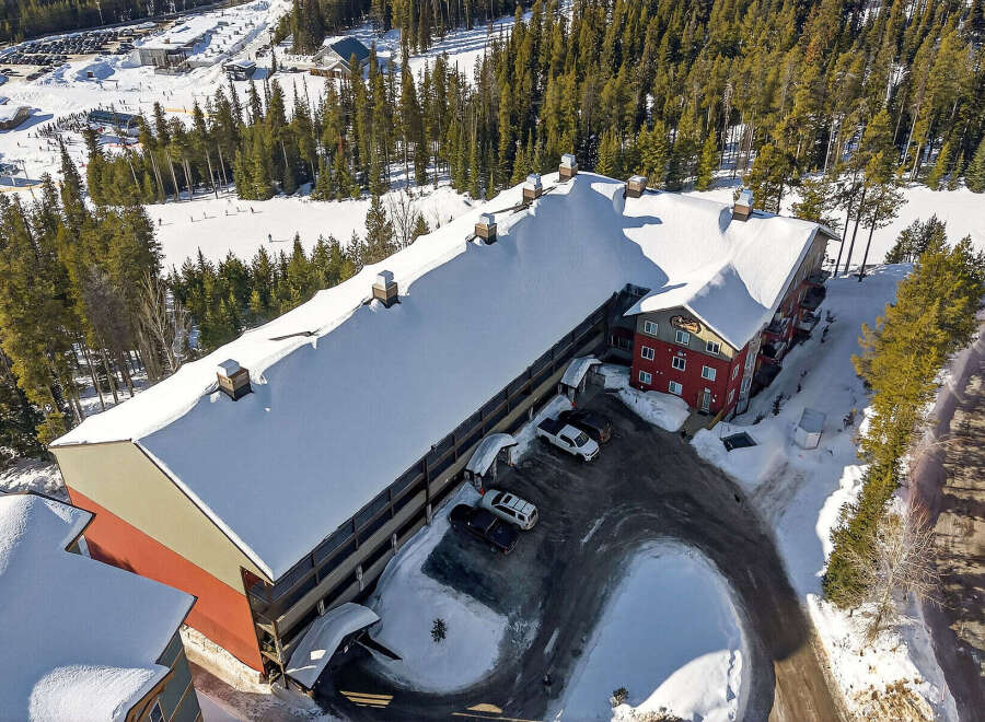 This stunning property offers a prime location with easy access to the slopes, perfect for ski enthusiasts.