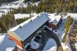 This stunning property offers a prime location with easy access to the slopes, perfect for ski enthusiasts.