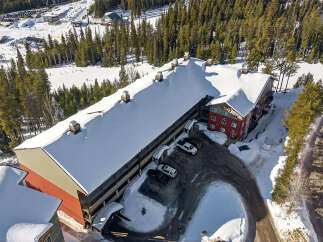 This stunning property offers a prime location with easy access to the slopes, perfect for ski enthusiasts.