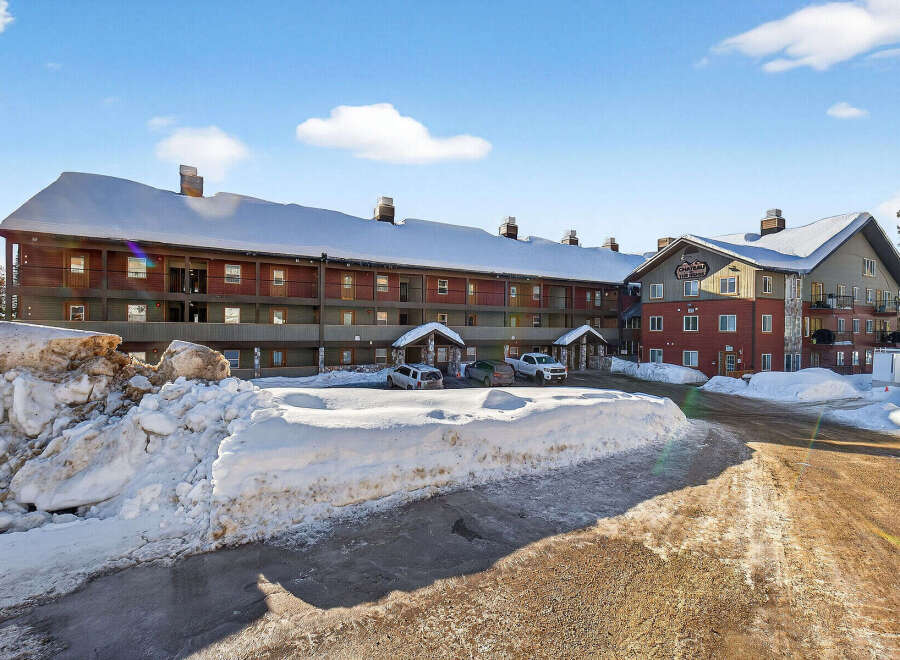 Discover the charm of this stunning property nestled in a winter wonderland.