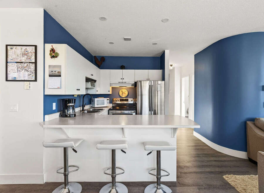 This stunning kitchen boasts modern design and functionality, perfect for culinary enthusiasts.