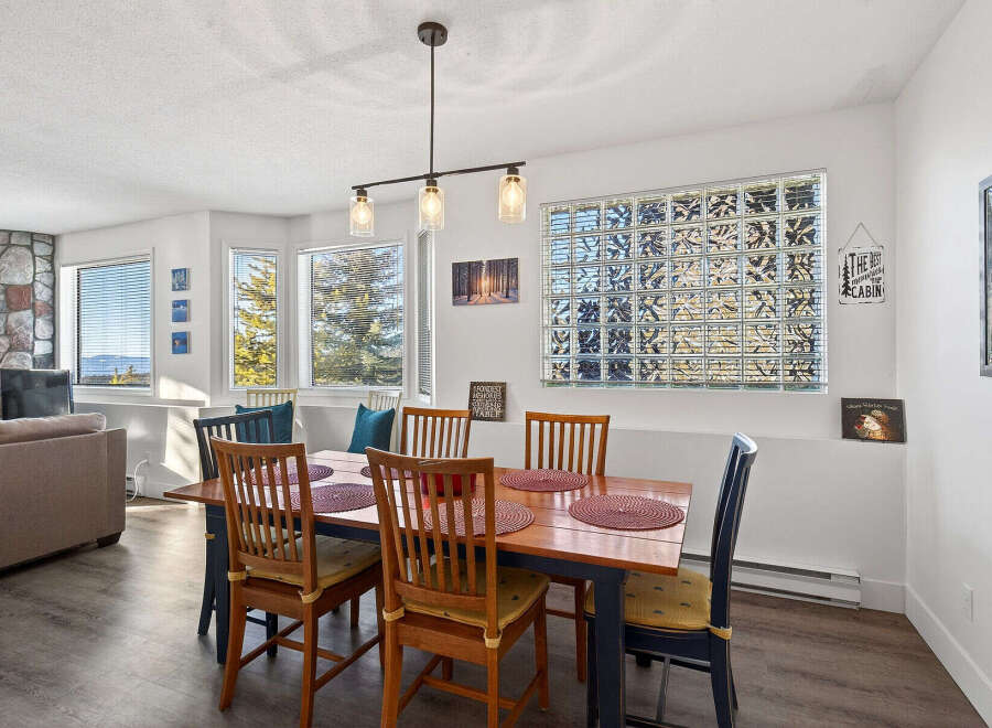 This charming dining area offers a warm and inviting space for meals and gatherings.