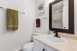This inviting bathroom features a clean and modern design, perfect for a relaxing retreat.