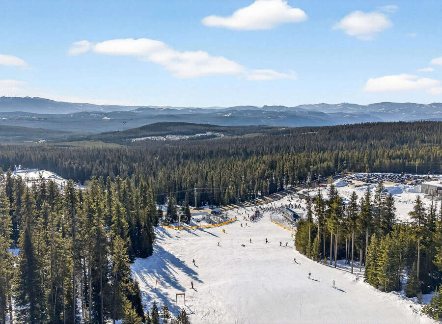 Experience the ultimate winter getaway with this stunning property nestled in the heart of a ski resort.