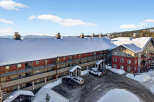 Discover the charm of Chateau The Ridge Resort, a stunning property nestled in a winter wonderland.