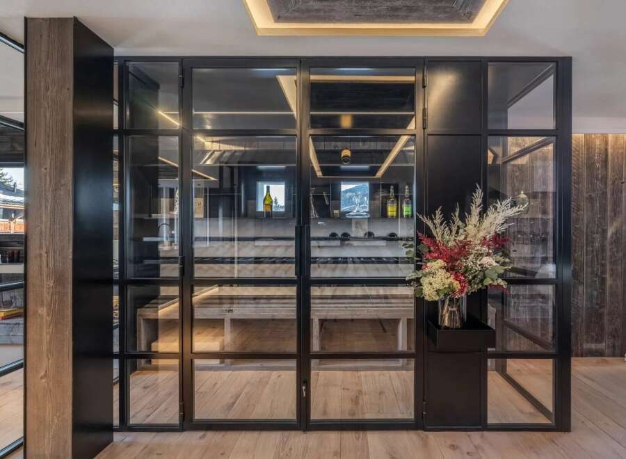 Discover luxury living with this stunning property featuring a custom wine cellar, perfect for the discerning homeowner.