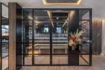 Discover luxury living with this stunning property featuring a custom wine cellar, perfect for the discerning homeowner.