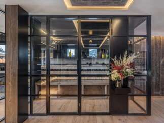 Discover luxury living with this stunning property featuring a custom wine cellar, perfect for the discerning homeowner.