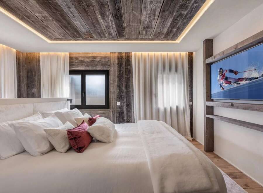 Experience luxury and comfort in this stunning bedroom.
