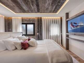 Experience luxury and comfort in this stunning bedroom.
