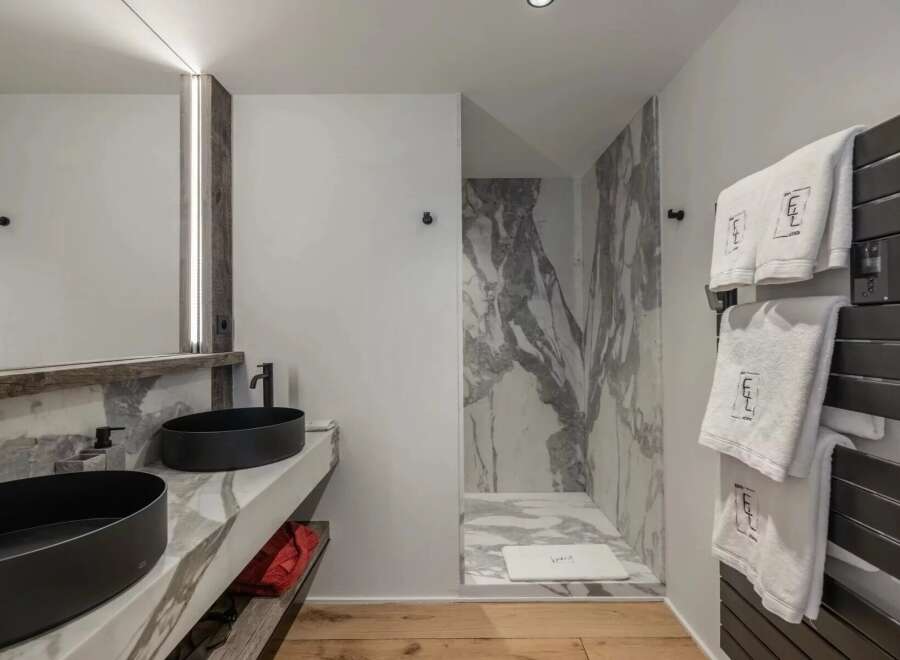 Step into luxury with this stunning bathroom featuring a sleek design and high-end finishes.
