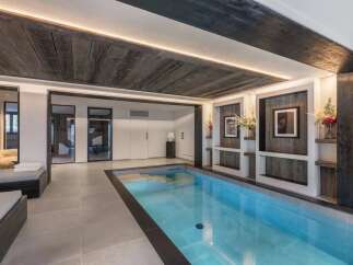 Indulge in luxury with this stunning indoor pool, perfect for year-round enjoyment.