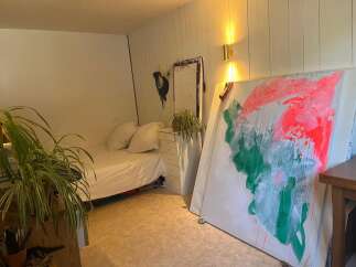 Discover the charm of this unique property, perfect for artists or those seeking a creative space.