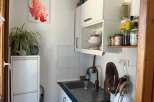 Discover the charm of this cozy kitchen, perfect for culinary adventures.