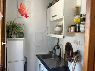 Discover the charm of this cozy kitchen, perfect for culinary adventures.