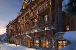 Experience the charm of this stunning mountain lodge, featuring a beautiful blend of stone and wood architecture.