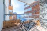 Enjoy breathtaking mountain views from this stunning balcony.
