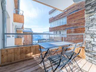 Enjoy breathtaking mountain views from this stunning balcony.