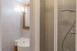 Step into a modern bathroom with a sleek design.