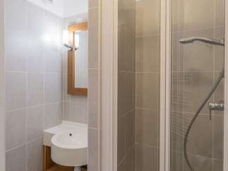Step into a modern bathroom with a sleek design.
