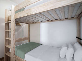 This cozy bedroom features a stylish bunk bed, perfect for maximizing space.