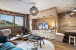 This cozy living space features a stunning wooden interior, creating a warm and inviting atmosphere.