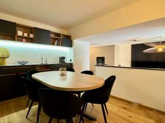 Discover modern living in this stylish property, featuring a beautifully designed dining area.