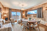 Experience the charm of this stunning property, featuring a warm and inviting interior with wood paneling throughout.