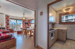 Discover this charming property featuring a cozy living area with a dining space and a well-equipped kitchen.