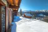 Experience the ultimate winter escape in this stunning chalet nestled in the heart of the mountains.