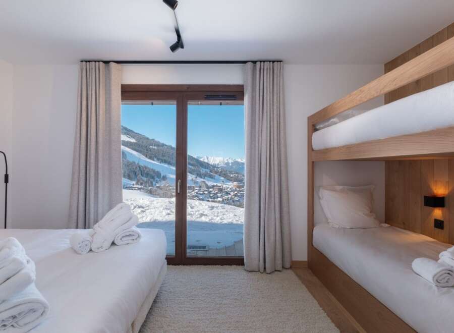 Experience the ultimate ski chalet retreat in this stunning bedroom.