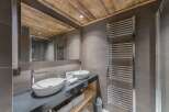 Discover luxury living in this stunning property featuring a modern bathroom.