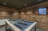 This stunning property boasts a luxurious game room, perfect for entertaining guests or enjoying a relaxing evening.