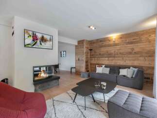 Experience luxury living in this stunning property featuring a cozy fireplace, perfect for those chilly evenings.