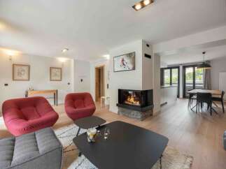 Experience luxury living in this stunning property featuring a cozy fireplace, perfect for relaxing evenings.