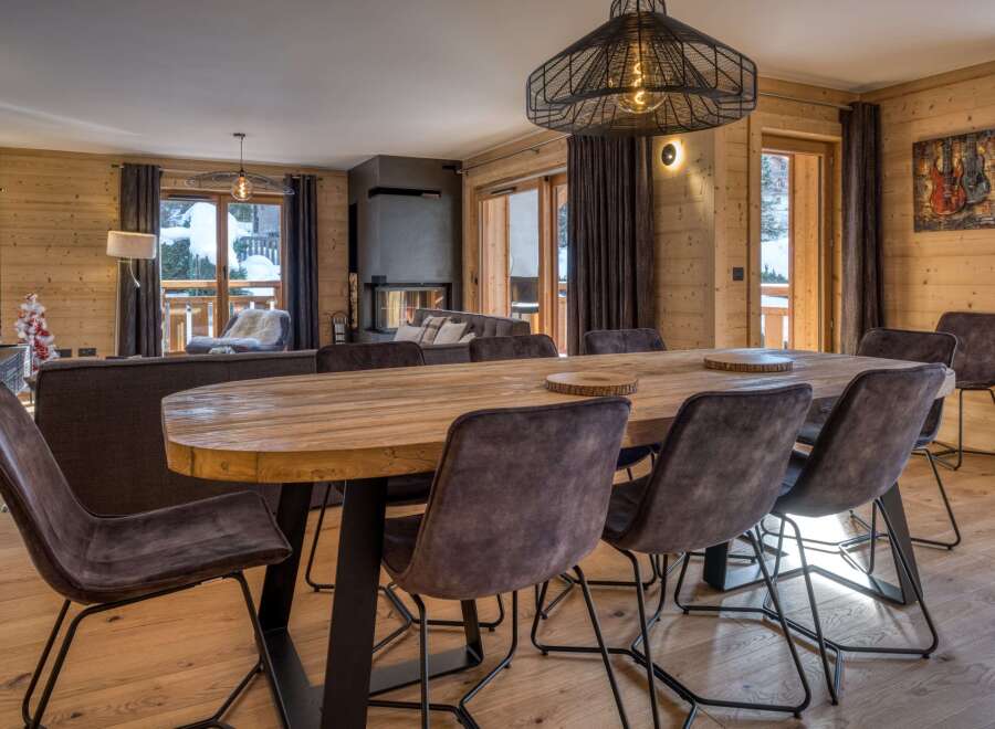 Experience luxury living in this stunning property featuring a spacious dining area.