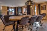 Experience luxury living in this stunning property featuring a spacious dining area.