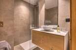 This modern bathroom features a sleek design with a minimalist aesthetic.