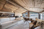 Experience the epitome of rustic luxury in this stunning property, featuring a beautifully designed interior with exposed wooden beams and a cozy ambiance.