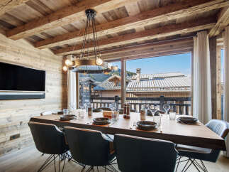 Experience luxury living in this stunning property, featuring a beautifully designed dining area.