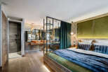 Experience luxury and comfort in this stunning bedroom.