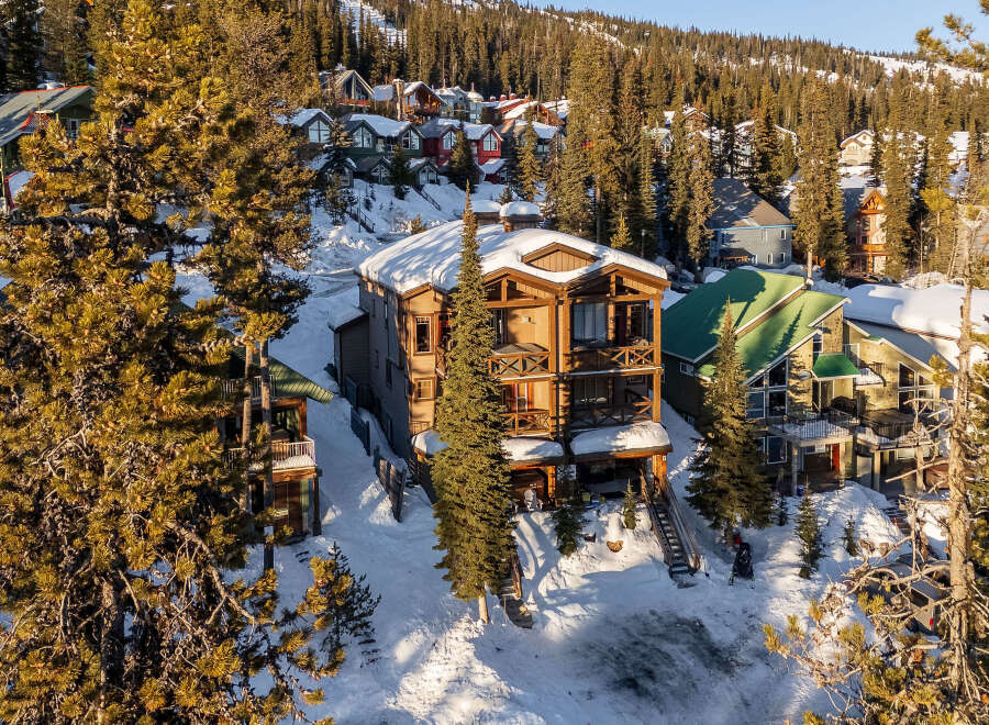 Discover the charm of this stunning mountain property, perfect for a luxurious getaway.