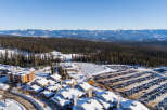 Discover the charm of this stunning mountain property, nestled in a winter wonderland.