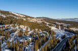Discover the charm of this stunning mountain property, nestled in a picturesque winter wonderland.