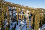 Nestled amidst a snowy landscape, this stunning property offers a serene escape.