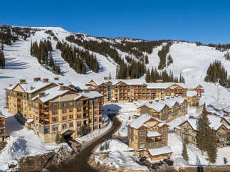 Experience luxury living at this stunning ski-in/ski-out property, offering unparalleled access to the slopes.