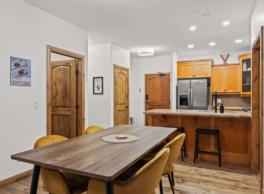 This stunning property boasts a modern kitchen with stainless steel appliances and ample cabinet space, perfect for culinary enthusiasts.