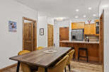 This stunning property boasts a modern kitchen with stainless steel appliances and ample cabinet space, perfect for culinary enthusiasts.